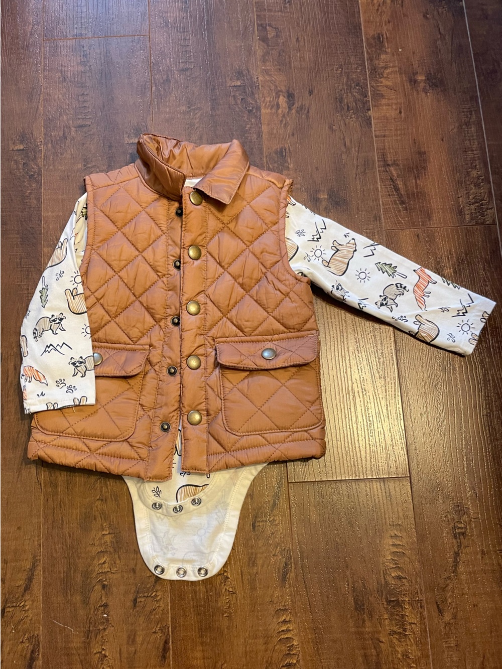 Aspen kids puffer vest with matching shirt.